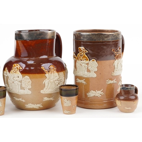 1157 - Royal Doulton stoneware including an Art Nouveau jar and cover, Toby tankard with silver rim and sal... 