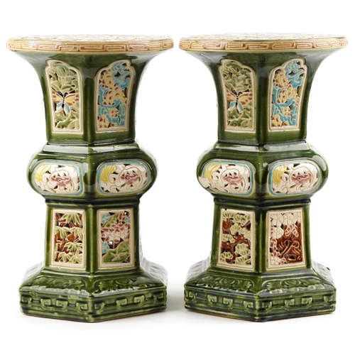 1368 - Pair of Chinese pierced porcelain archaic style garden seats each hand painted with flowers having s... 