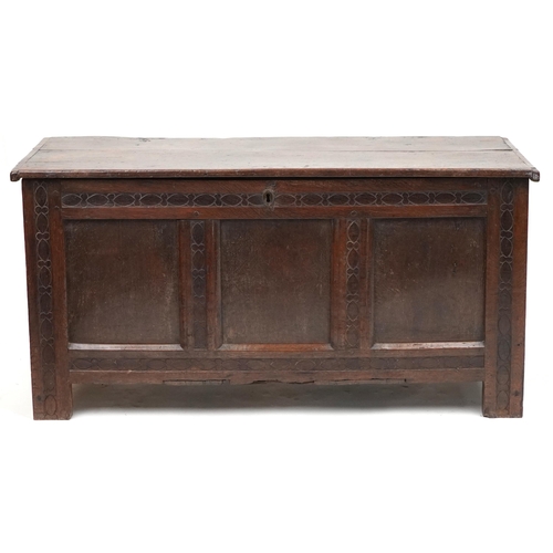 1008 - 17th/18th century oak three panel coffer with carved borders, 59cm H x 118cm W x 51cm D