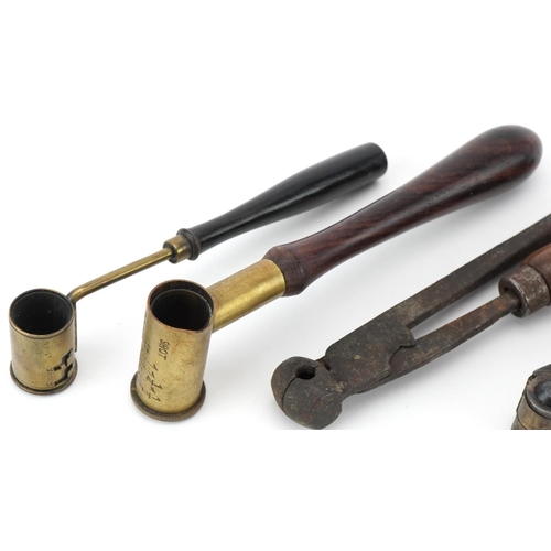 1783 - Two wooden and brass shotgun cartridge makers along with an wooden handled shot maker including an I... 