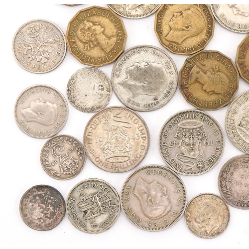 619 - Assorted silver and later coinage including sixpences and threepenny pieces, George V and later