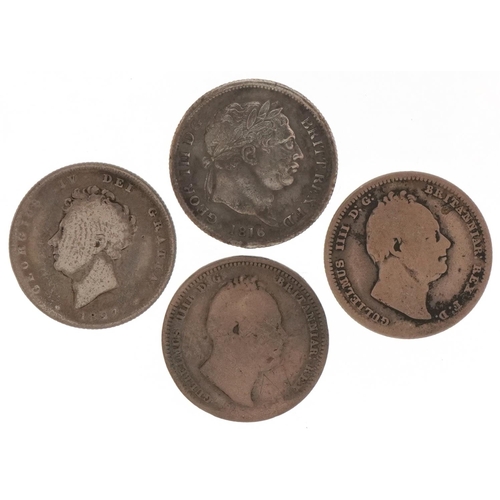 588 - Three George III silver shillings and a George IV silver shilling