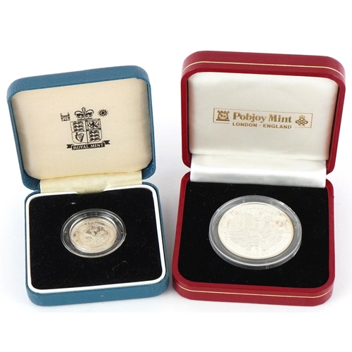 634 - Elizabeth II 1994 silver proof one pound and a Pobjoy Mint Queen Mother five pounds