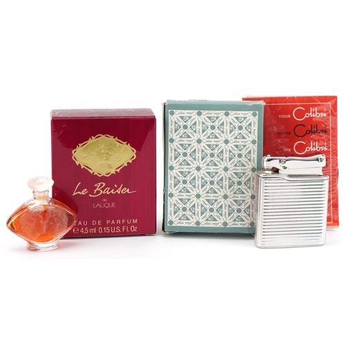 1302 - Calibri table lighter with box together with a Lalique Le Baiser perfume with box