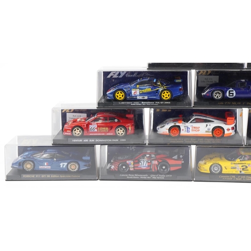 1590 - Sixteen Fly 1:32 scale model slot cars with cases including Corvette C5R, Porsche 911 GTI 98 Edition... 