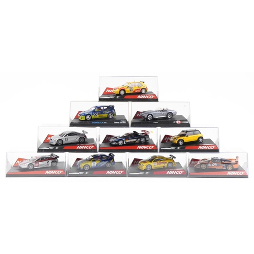 1593 - Ten Ninco 1:32 scale model slot cars with cases including Citroen Saxo, LTDTTABT and Mini