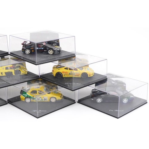 1599 - Nine Pro Slot 1:32 scale model slot cars with cases including Toyota GT-One, Porsche 911 GT2 and Alf... 