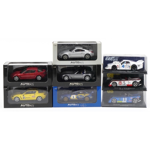 1601 - Eight 1:32 scale model slot cars with boxes and cases including Fly Lancia Beta, Autoart Mazda RX8 a... 