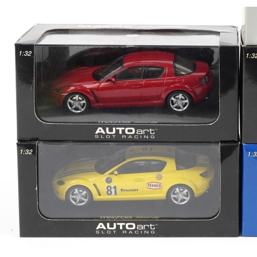 1601 - Eight 1:32 scale model slot cars with boxes and cases including Fly Lancia Beta, Autoart Mazda RX8 a... 