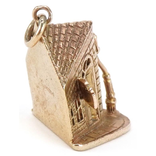 2030 - Large 9ct gold charm in the form of a crooked Pub on the Corner, 2.5cm high, 7.0g