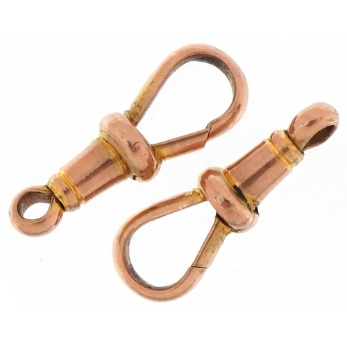 2165 - Two 9ct rose gold dog clip clasps, each 2cm in length, total 2.5g