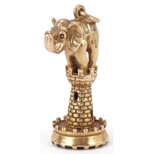 2317 - Large 9ct gold charm in the form of an elephant on a castle with carnelian matrix, 3.5cm high, 9.3g