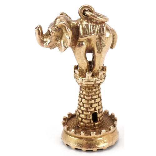 2317 - Large 9ct gold charm in the form of an elephant on a castle with carnelian matrix, 3.5cm high, 9.3g