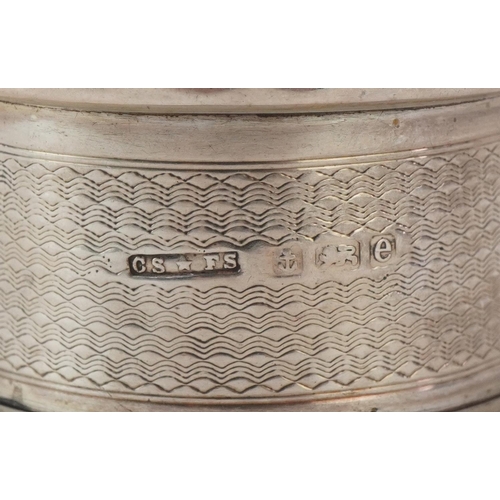 504 - Ten Victorian and later silver napkin rings, some with engine turned decoration, the largest 5cm in ... 