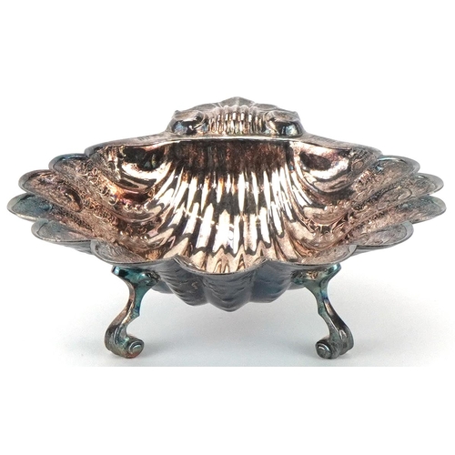 512 - David Hollander & Son, George VI silver shell shaped dish profusely engraved with flowers and foliag... 