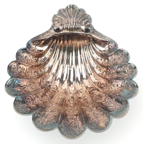 512 - David Hollander & Son, George VI silver shell shaped dish profusely engraved with flowers and foliag... 