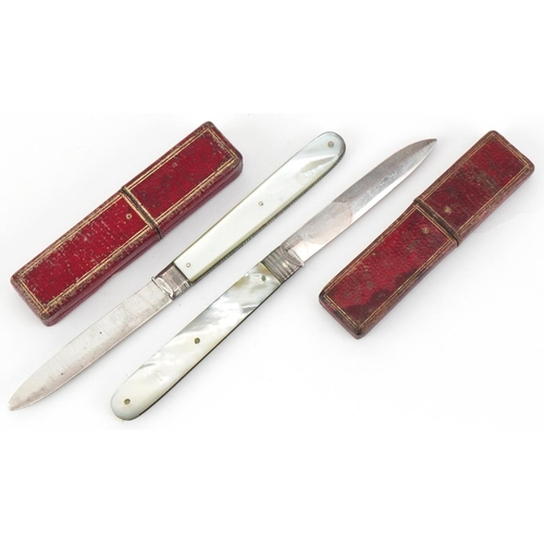 41 - Two Georgian mother of pearl flanked silver folding fruit knives, each housed in a tooled leather fi... 