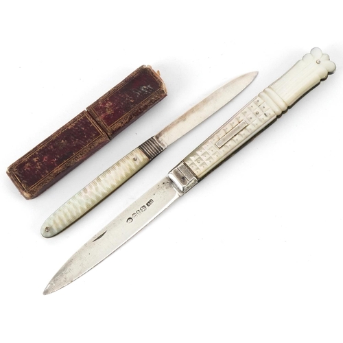 45 - Two Georgian and later mother of pearl flanked silver folding fruit knives, one with tooled leather ... 