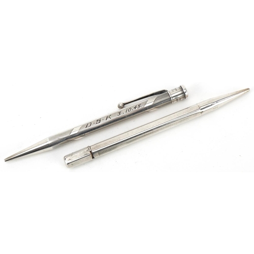 472 - Two engine turned silver propelling pencils including Yard-O-Led, the largest 12cm in length, total ... 