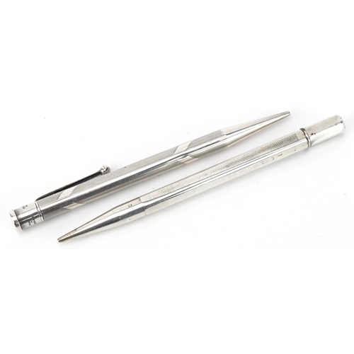 472 - Two engine turned silver propelling pencils including Yard-O-Led, the largest 12cm in length, total ... 