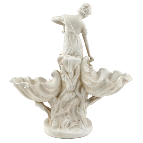 1291 - Large Parian style porcelain centrepiece in the form of a semi clad female catching a fish, 43cm hig... 