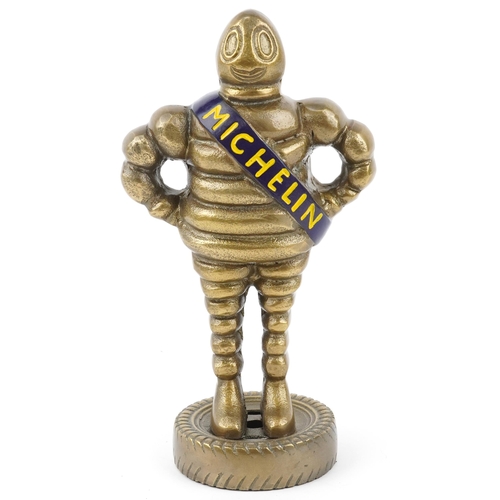 1399 - Gilt painted metal advertising figure of a Michelin Man, 28cm high