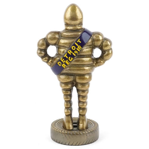 1399 - Gilt painted metal advertising figure of a Michelin Man, 28cm high