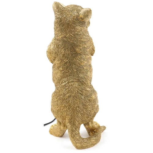 1373 - Ornate gilt painted table lamp in the form of a standing cat, 40cm high