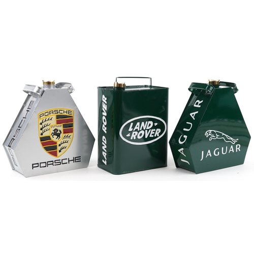 1442 - Three advertising metal fuel cans a Porsche, Jaguar and Land Rover, each 34cm high