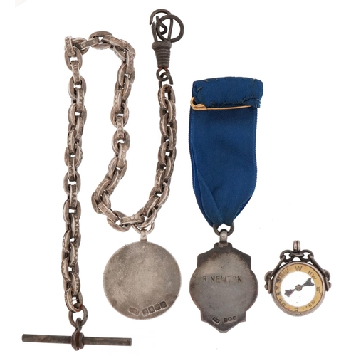 2674 - Silver jewellery comprising watch chain with T bar, compass fob and two sports jewels, total 42.0g