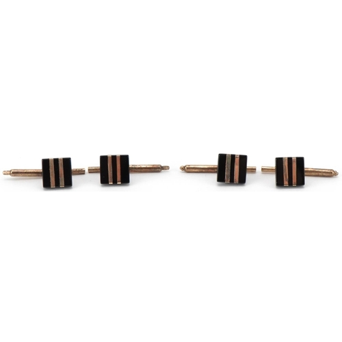 2137 - Set of four Art Deco sterling silver gilt and black onyx gentlemen's studs, each 2.5cm in length, to... 