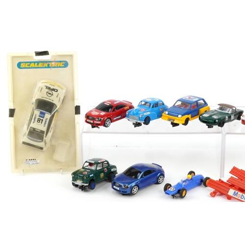 1586 - Eleven vintage and later slot cars and accessories including Scalextric and Hornby