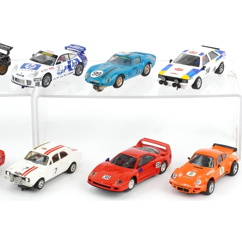 1580 - Ten vintage and later slot cars including Scalextric, Carrera Evolution and Hornby