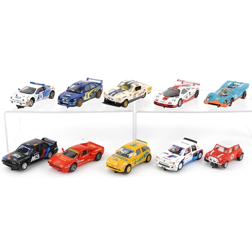 1584 - Ten vintage and later slot cars including Scalextric, Hornby and Ninco