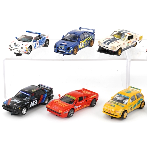 1584 - Ten vintage and later slot cars including Scalextric, Hornby and Ninco