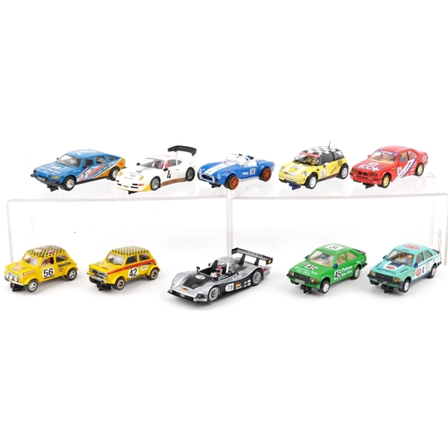 1582 - Ten vintage and later slot cars including Scalextric, Carrera Evolution and Hornby