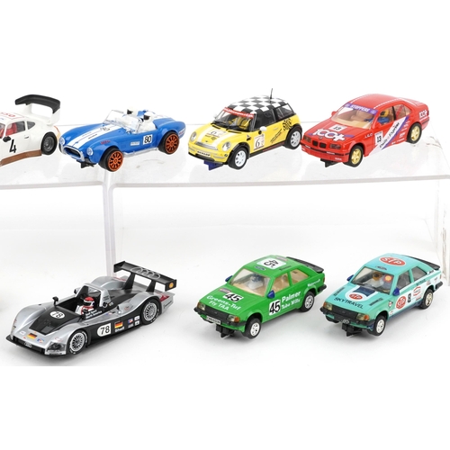 1582 - Ten vintage and later slot cars including Scalextric, Carrera Evolution and Hornby