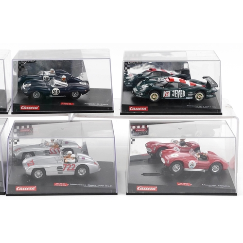 1635 - Six Carrera Evolution slot cars with cases comprising Porsche 911 GTI 98, Jaguar D Type, Jaguar D Ty... 