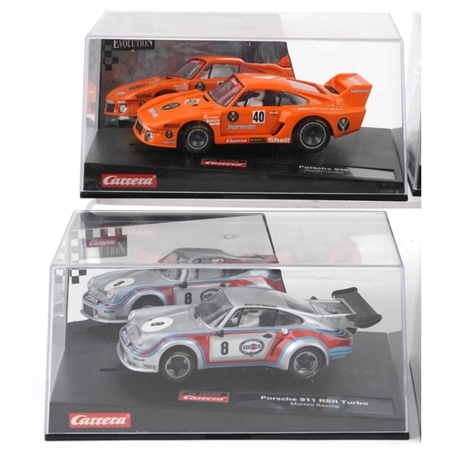 1676 - Six Carrera Evolution slot cars with cases comprising Porsche 935, Aston Martin V12 Vanquis, Audi A4... 