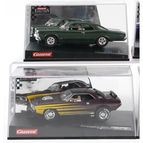 1637 - Six Carrera Evolution slot cars with cases comprising Dodge Charger 500, Porsche Carrera GT, Chevrol... 