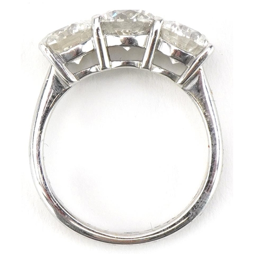 2003 - 18ct white gold diamond three stone ring, total diamond weight approximately 3.05 carat, size M, 4.4... 