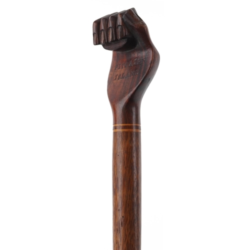 364 - Hardwood Pitcairn Islands clenched fist walking stick, 94cm in length