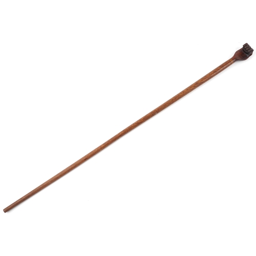 364 - Hardwood Pitcairn Islands clenched fist walking stick, 94cm in length