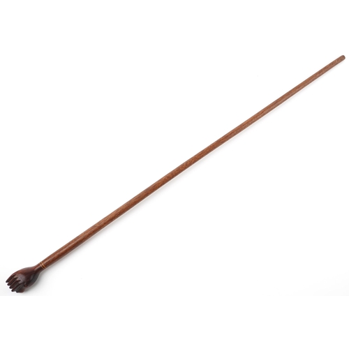 364 - Hardwood Pitcairn Islands clenched fist walking stick, 94cm in length