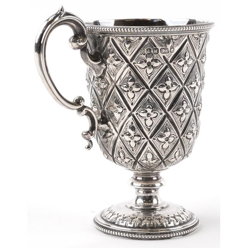 152 - Martin, Hall & Co, Victorian aesthetic silver pedestal cup embossed with stylised flowers, Sheffield... 