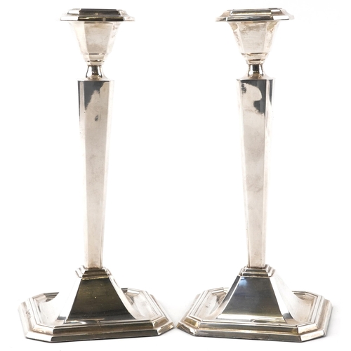 157 - Pair of continental 925S sterling silver tapering candlesticks, possibly Danish, each numbered 53, e... 