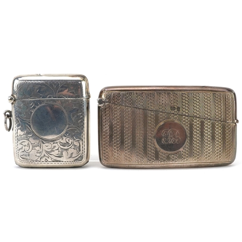 162 - Victorian silver engine turned card case and a George V silver floral engraved vesta, the largest 8c... 