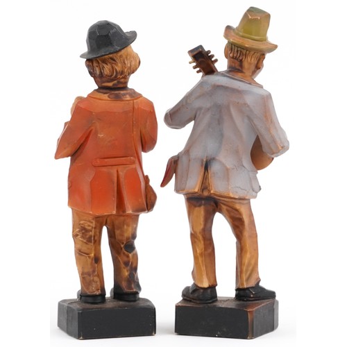 320 - Pair of hand painted European carved wooden statues of musicians, each 15cm high