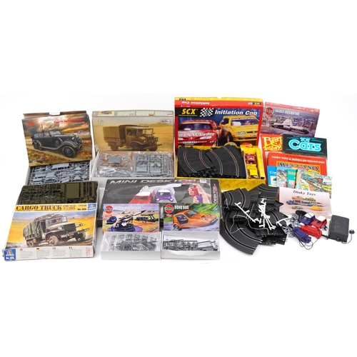 1685 - Vintage and later model kits, slot car racing tracks and toy collector's guides including SCX 1:32 s... 