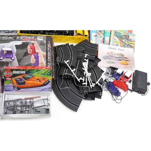 1685 - Vintage and later model kits, slot car racing tracks and toy collector's guides including SCX 1:32 s... 